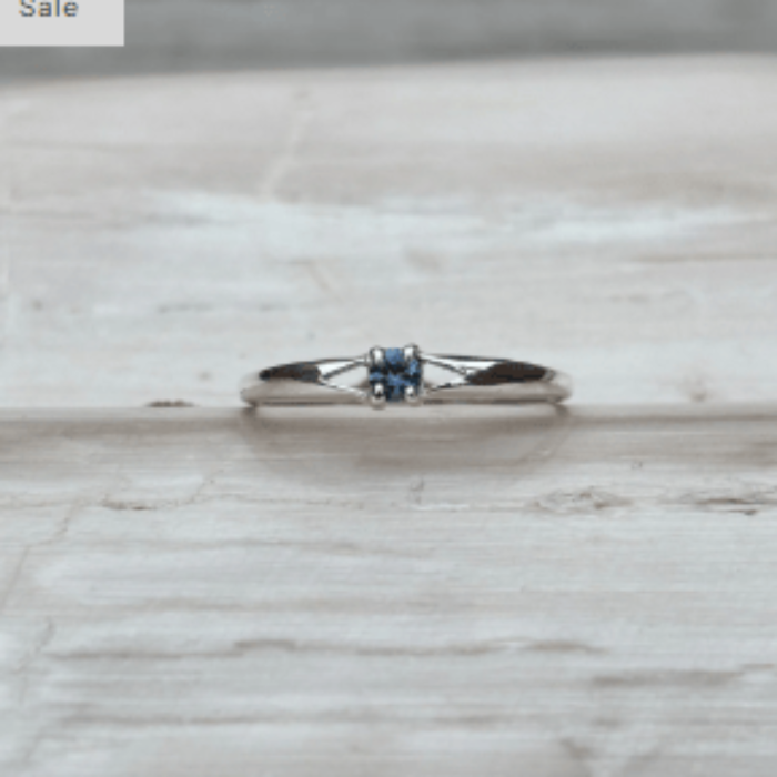 Silver ring with a small Rock Creek Sapphire 