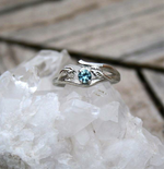 Ring with branch texture and blue sapphire