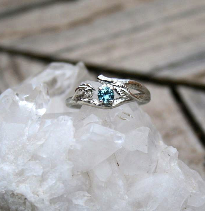 Ring with branch texture and blue sapphire