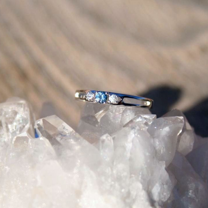 Montana Sapphire 3 stone ring on quartz crystal
