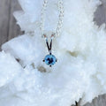 Silver necklace with a blue Montana sapphire pendant